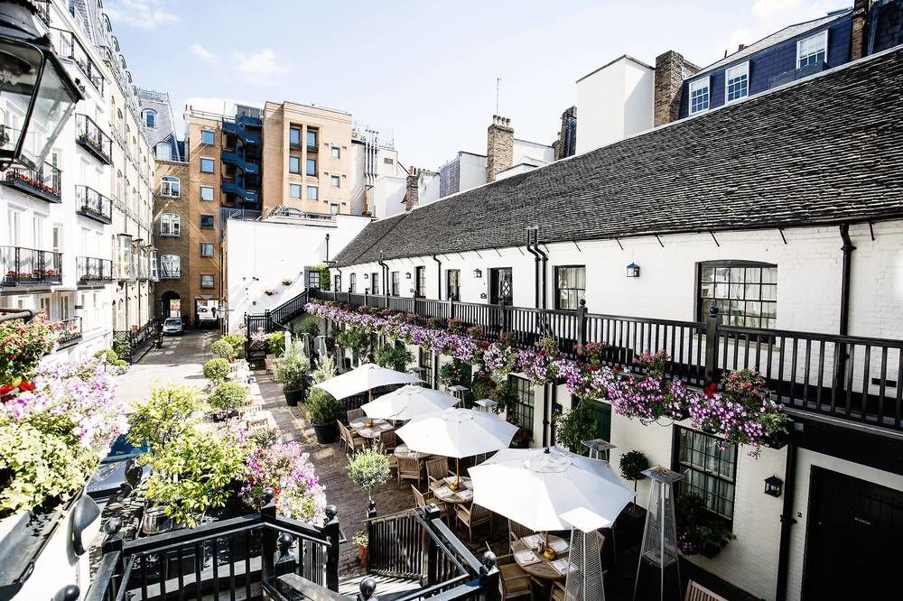 The Stafford London Hotel Exterior foto The courtyard at the Swan Inn